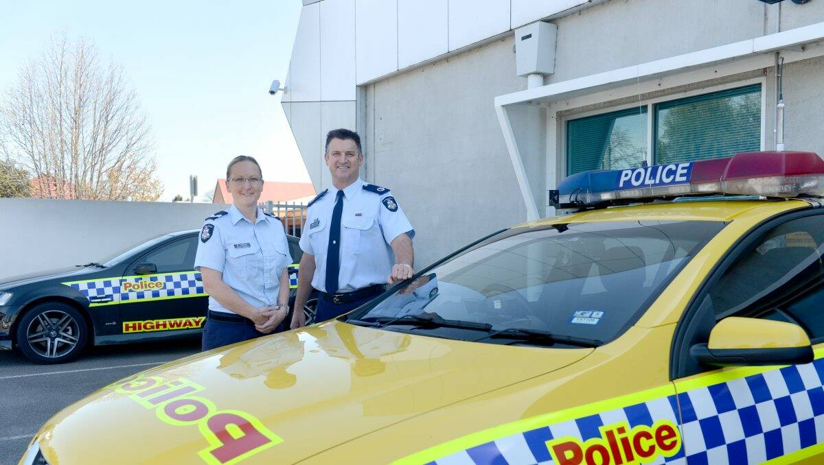Sending a message: Senior Constable Rachel Colliver with Assistant Commissioner for Road Policing Robert Hill outside Bendigo police station. Picture: JIM ALDERSEY