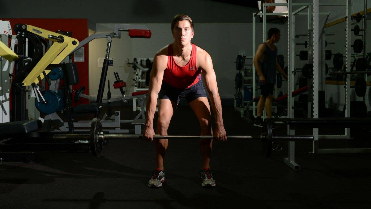 LIFT: Talented decathlete Blake Pryse working out at Feelgood Fitness in Golden Square. Picture: Jim Aldersey