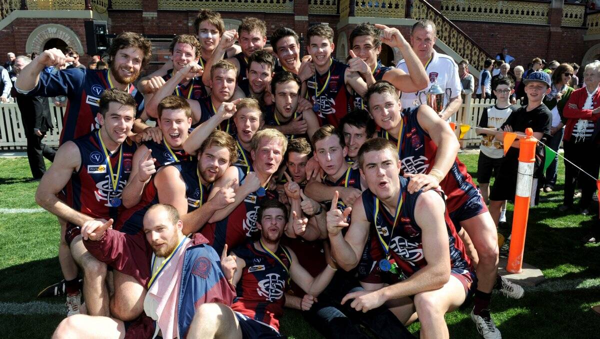 GUTSY WIN: Sandhurst's reserves celebrate after an eight-point victory in the grand final. Picture: JIM ALDERSEY
