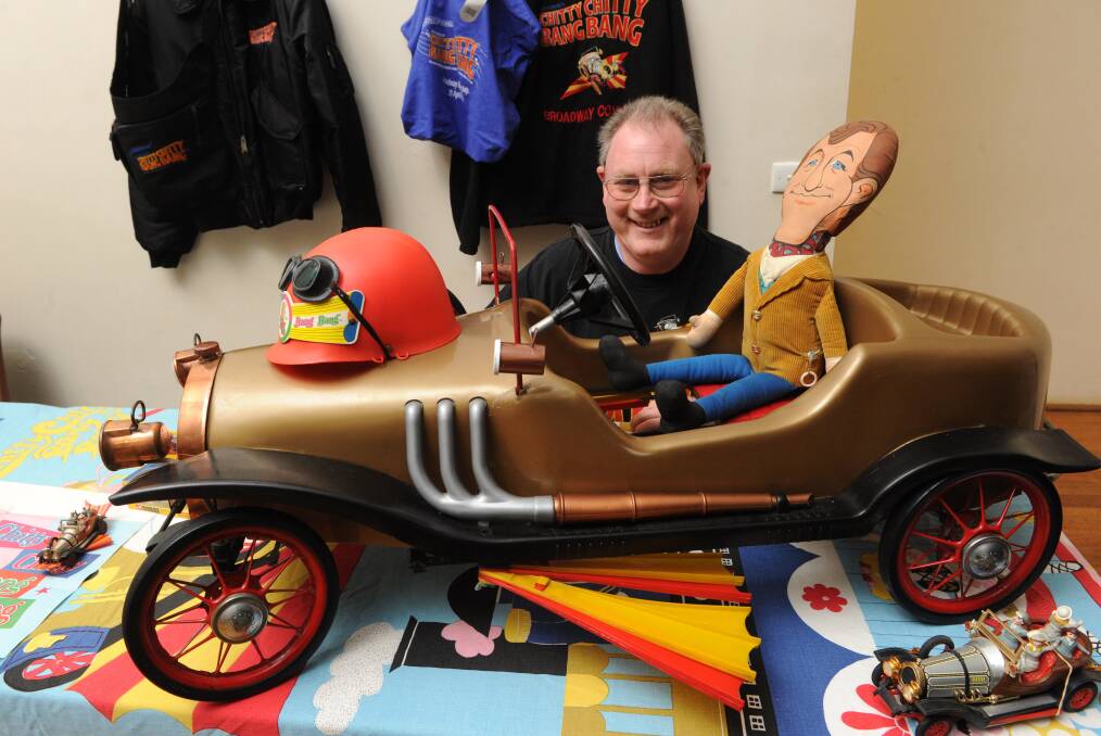 Prized memorabilia: Chitty Chitty Bang Bang collector Kent Bates with his mint condition pedal car. Picture: Peter Weaving