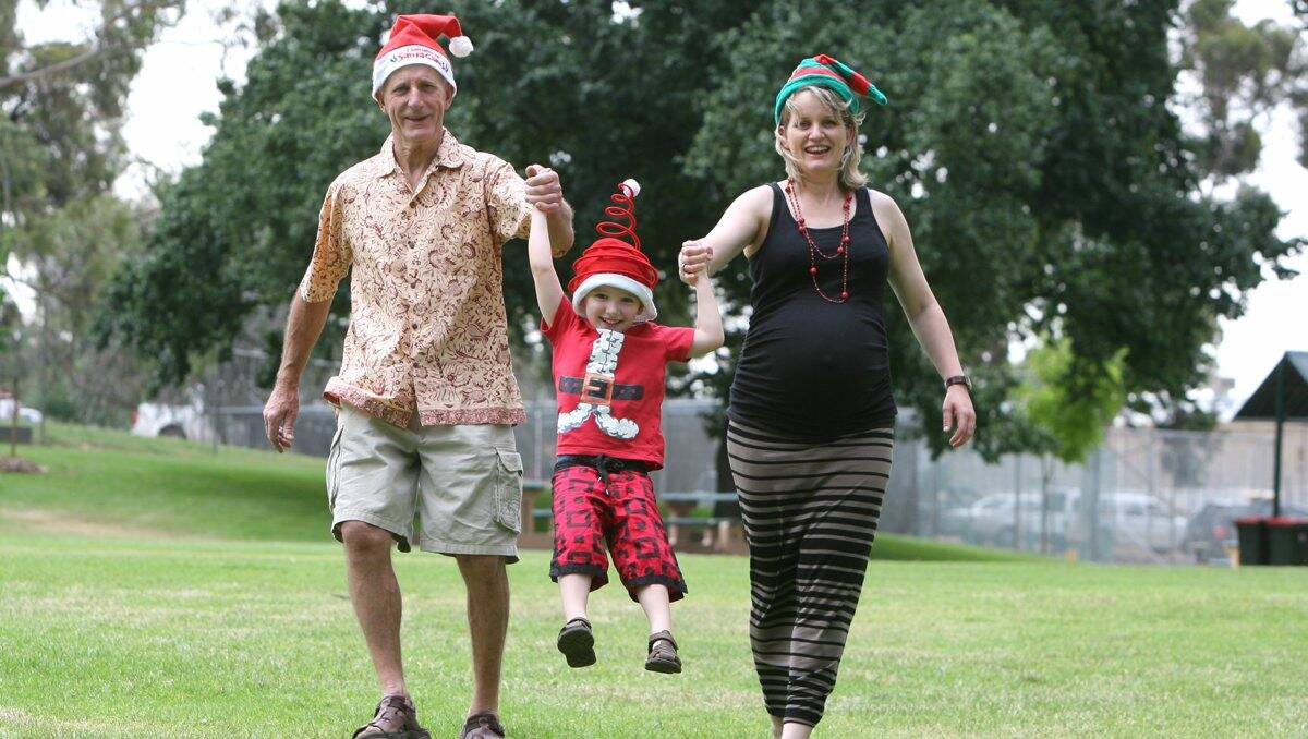 SING-A-LONG: Eaglehawk’s Dave Richards with his daughter Simone Martin and grandson Henry Martin, 3. Picture: PETER WEAVING
