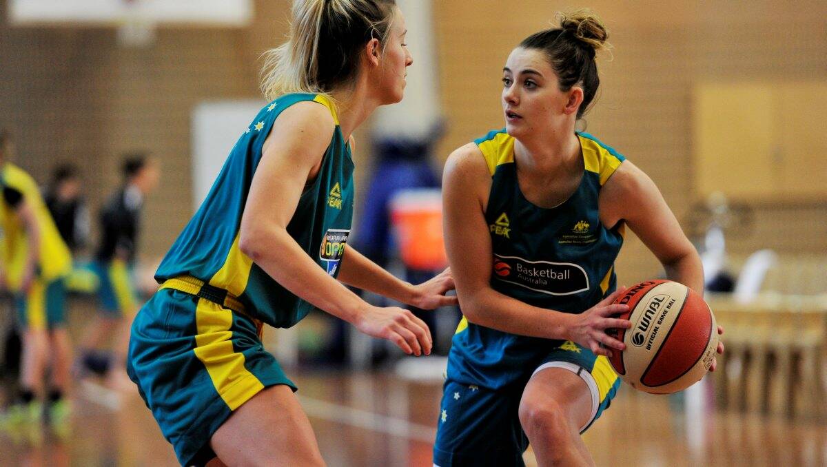 TURNING HEADS: Bendigo Spirit signing Tessa Lavey at training with the Opals in Canberra this week.Picture: CANBERRA TIMES