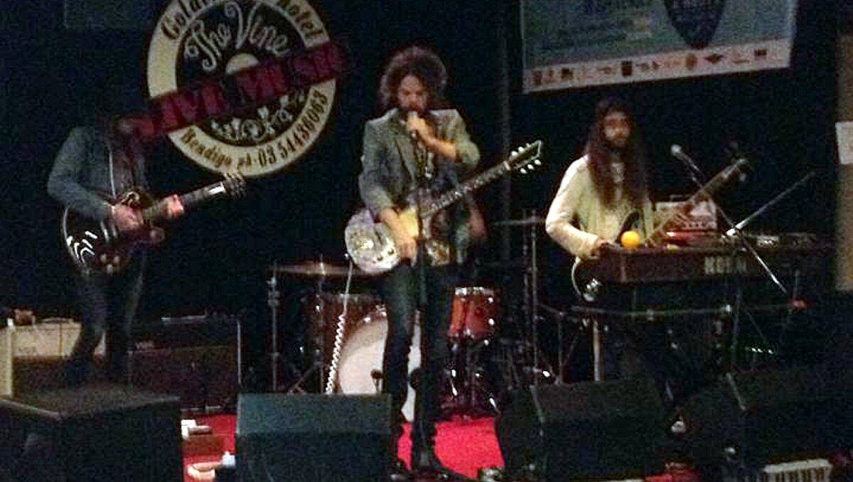 Wolfmother’s Andrew Stockdale pumps up the crowd at the Golden Vine on Friday night. Picture: CLARK WATT (contributed)