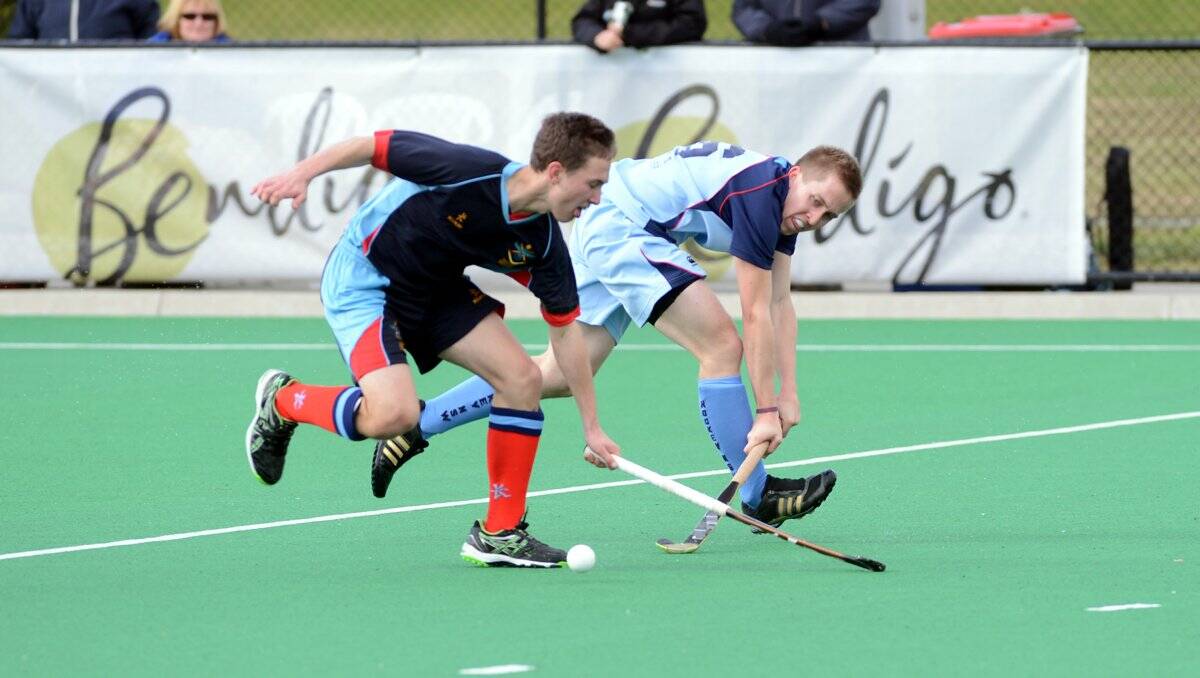 SPRINT:Action from yesterday's battle between the Australian Defence Force and New South Wales at the Central Victoria Hockey Association complex in Ironbark. Picture: JIM ALDERSEY