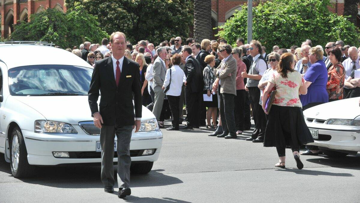 Farewell: Mourners at the funeral of Garry Angus at St Kilian’s Catholic Church last year. 