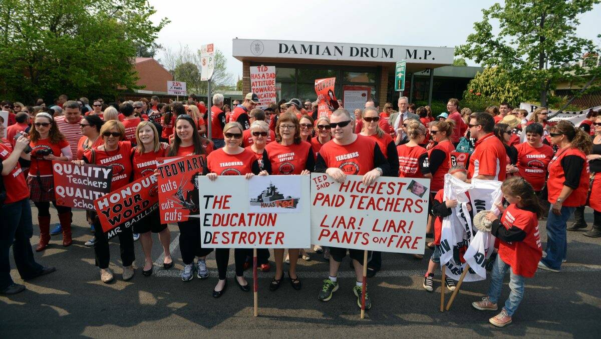 United: Teachers, principals and support staff rallied outside Damian Drum’s office yesterday. Picture: Jim Aldersey