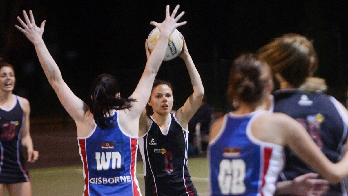 CLASS: Sandhurst centre Brianna Dalrymple-Monro looks for an option in Saturday night's A-grade preliminary final win against Gisborne on the QEO court. Picture: BRENDAN McCARTHY