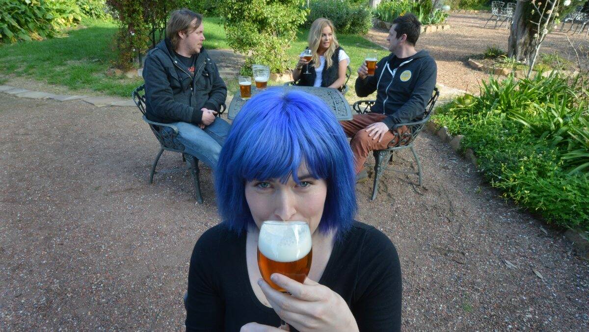 INDULGE: Erin Williams enjoys a frothy beverage ahead of this weekend’s Bendigo Beer Homebrew Competition, with Fatty Anderson, Renée Considine and Trev Birks also getting in the spirit and kicking back with a brew.  Picture: Brendan McCarthy 
