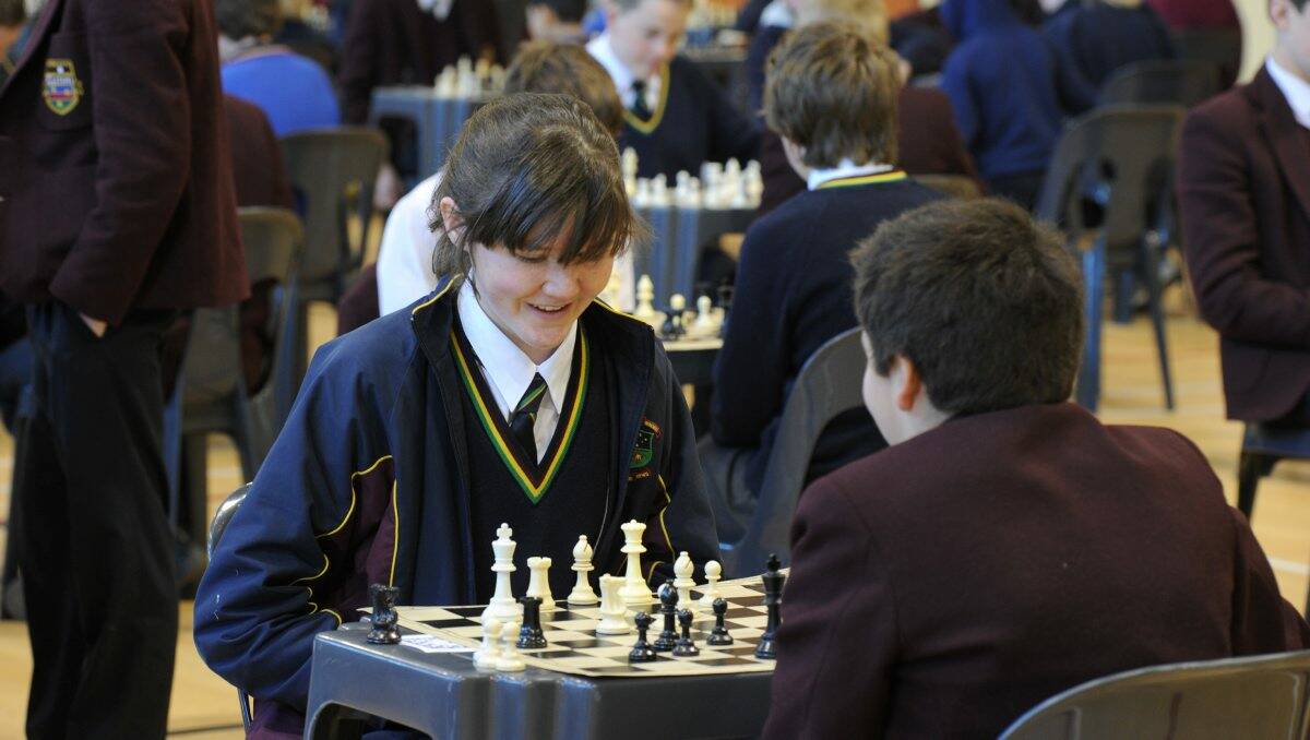 CHECKMATE: Girton Grammar student Charlotte Lyons sizes up her opponent.   Picture: PETER WEAVING