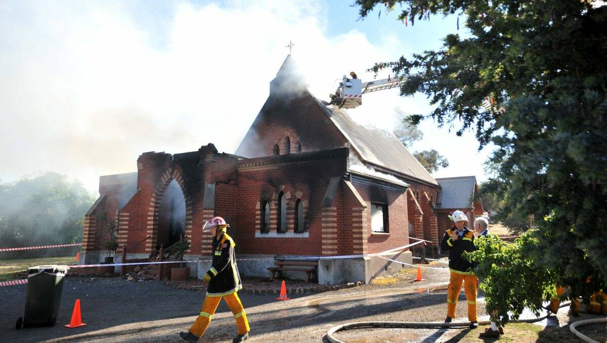 GUTTED: St Mary’s Anglican Church in High St Kangaroo Flat burns. Picture: BILL CONROY
