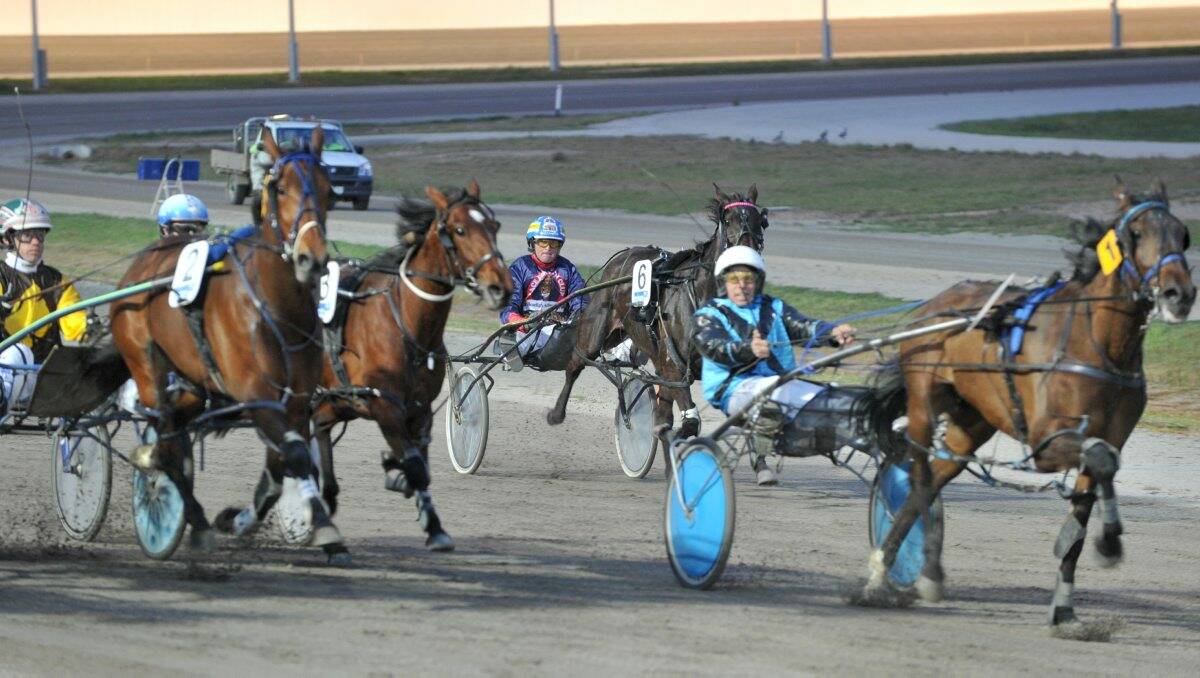 Addy, middle, finishes behind the main field at Bendigo last night.
