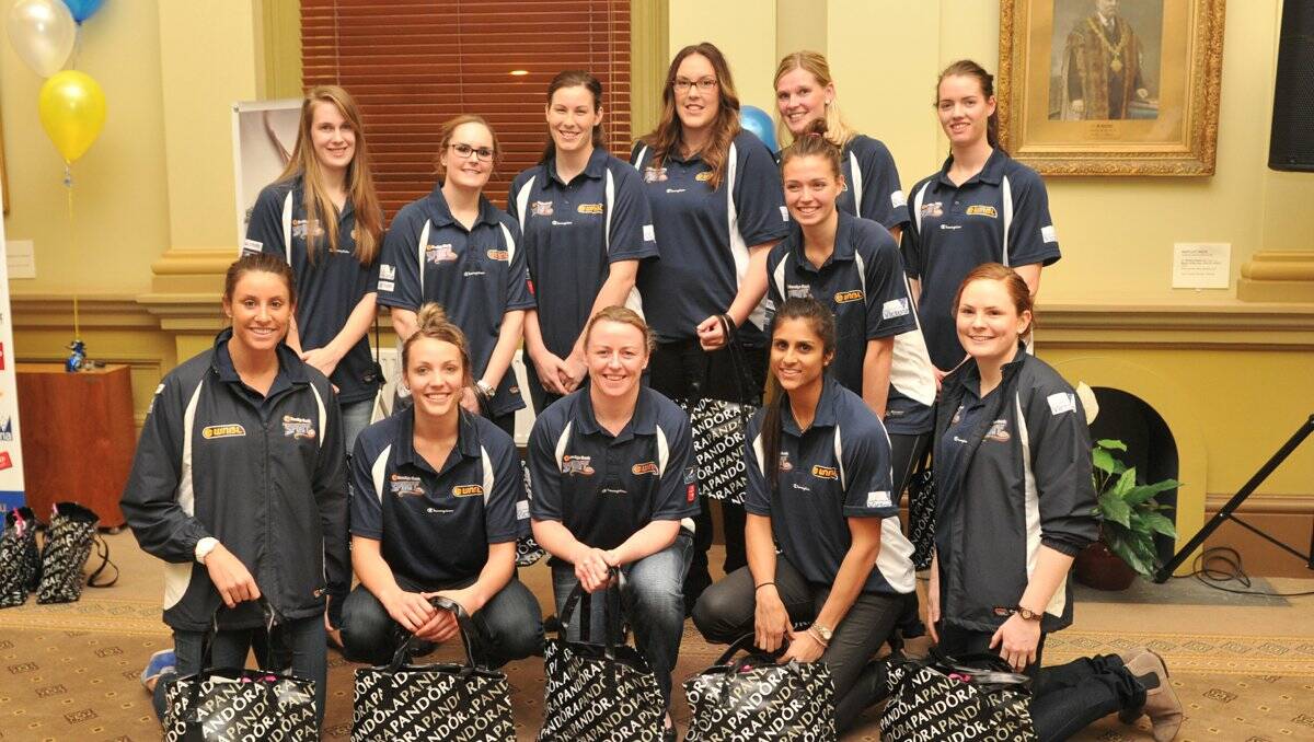 NEW-LOOK SQUAD: The Bendigo Spirit’s line-up for the 2012-13 Women’s National Basketball League season was all smiles at last night’s function at the Bendigo Town Hall. Picture: JODIE DONNELLAN 