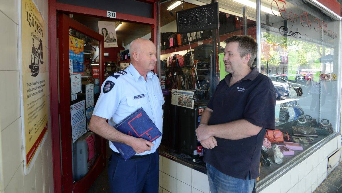 VIGILANT: Leading Senior Constable Rod Brown and Bendigo Traders Association president Ross White talk about shoplifting. Picture: JIM ALDERSEY