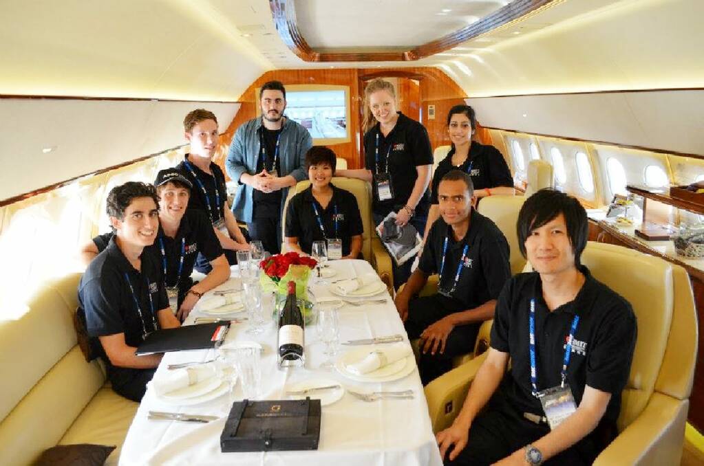 FRESH IDEAS: The RMIT team inside a corporate jet at the Avalon Airshow. Martin Burston is second from left, wearing the cap. Picture: CONTRIBUTED