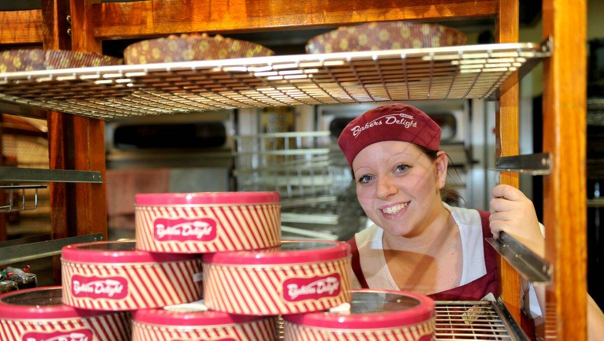 SWEET TREATS: Bakers Delight sales assistant Chantelle Marshall. Picture: JODIE DONNELLAN