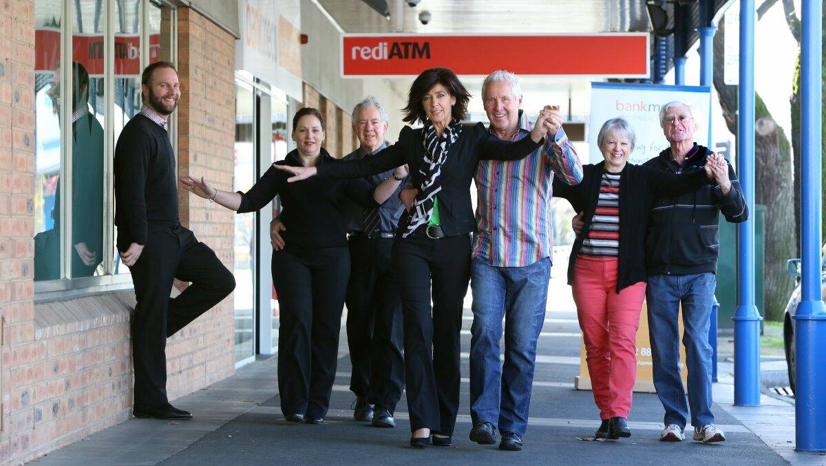 Bankmecu national community banking manager Steven Lynch checks out the dancing form of Glass Slipper Ball participants, from left, Sue Barowski and Eddie Barkla, Karen and Keith Sutherland and Cheryl and Ian Hardie in Bendigo yesterday.
