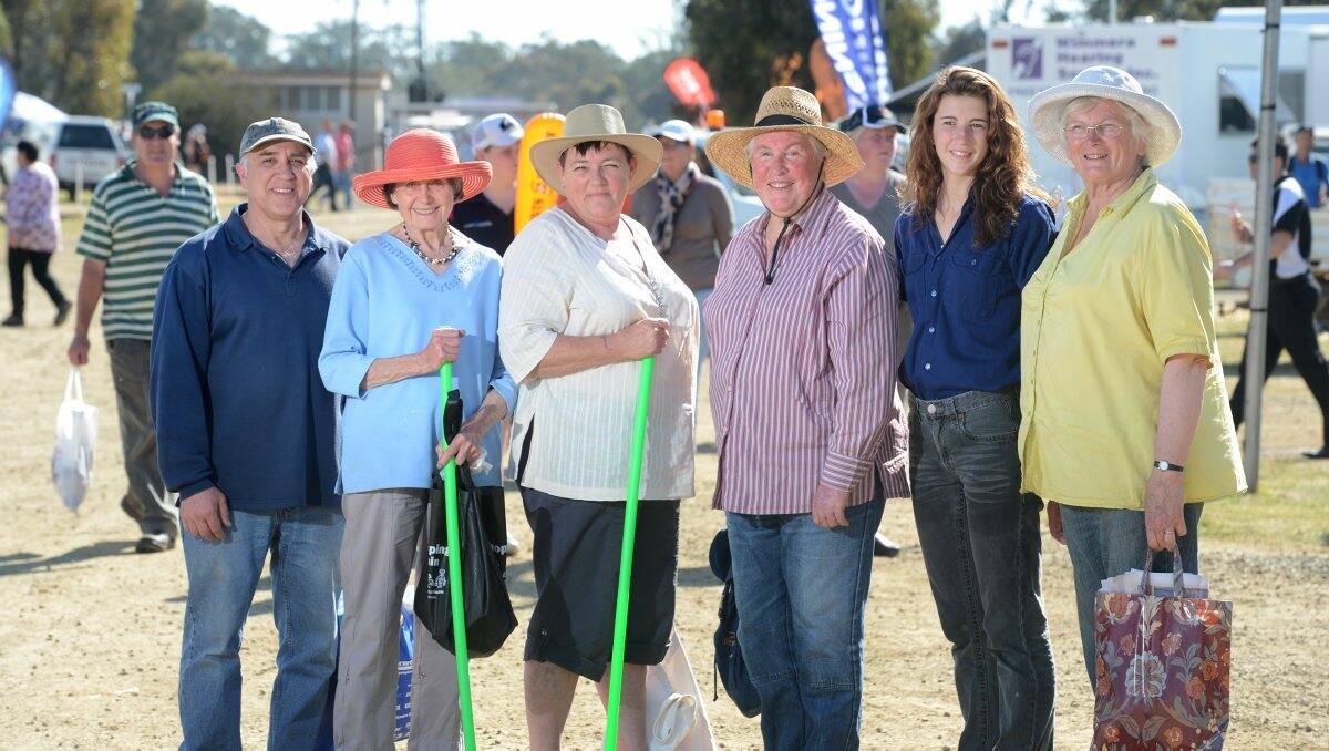 Get-together: Mary Bennett, Faye Holland, Elaine Murphy, Erin Campbell and Briony Barker caught the bus to the Elmore Field Days yesterday. Picture: JIM ALDERSEY