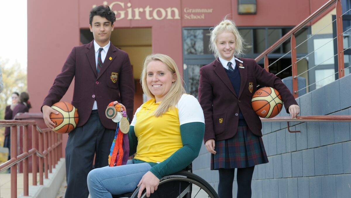 Paralympian Shelley Chaplin with Girton Grammar School basketball captains James Brown and Chelsea Bier. Picture: Jodie Donnellan