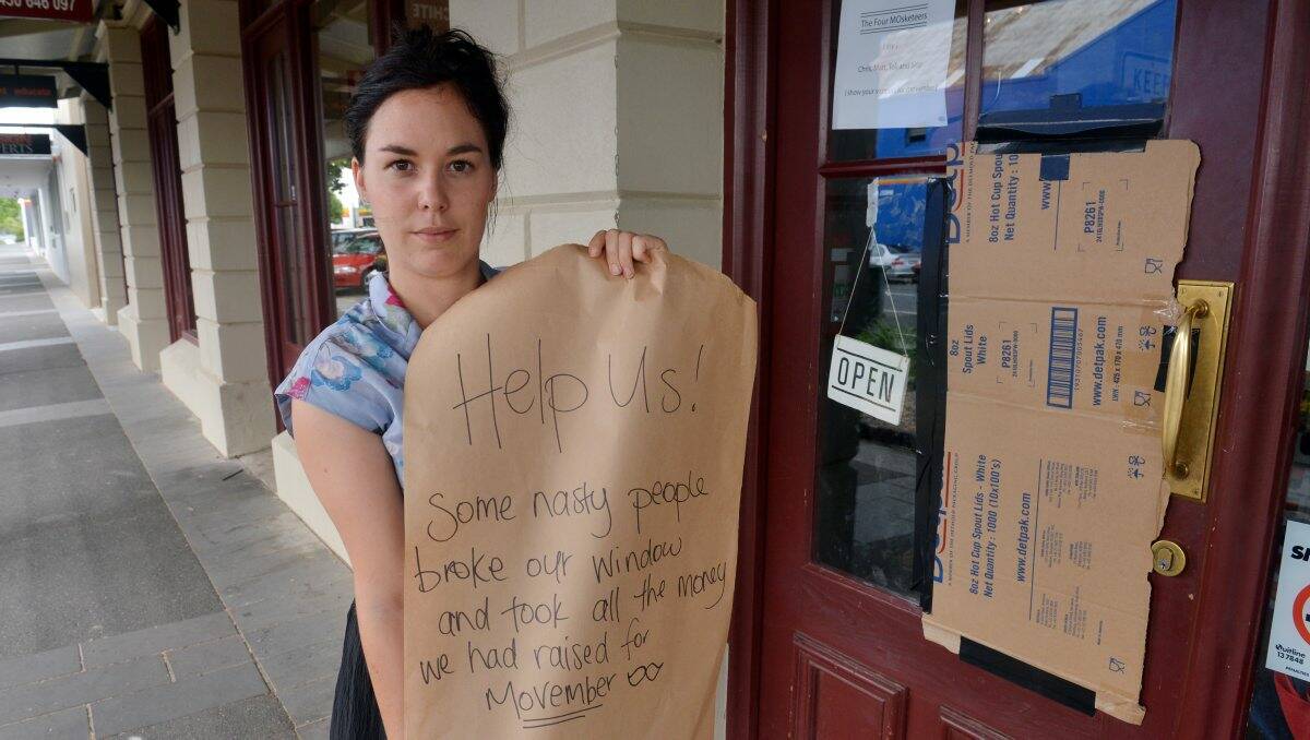 STOLEN: Old Green Bean owner Zoe Waddington outside the cafe where thieves broke in and stole donations. Picture: BRENDAN McCARTHY