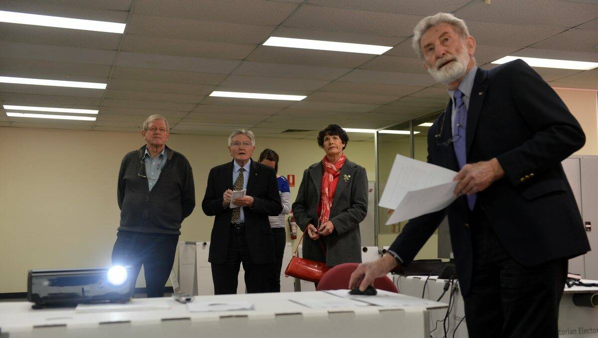Luck of the draw: Returning officer Tony McDowell reveals the ballot paper order. Picture: Brendan McCarthy