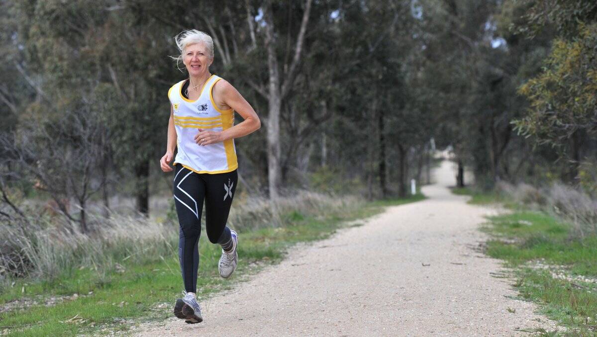 KEEP ON RUNNING: Jenny Buchanan  has completed an amazing 27 marathons after deciding to tackle her first in 2000 as a new millenium resolution. Picture: PETER WEAVING