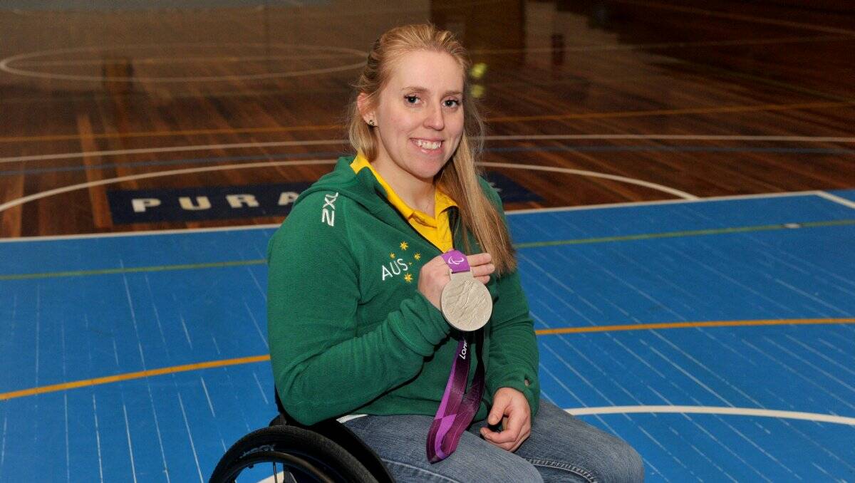 ALL SMILES: Harcourt's Shelley Chaplin with the silver medal won in wheelchair basketball at the London Paralympics. Picture: JODIE DONNELLAN