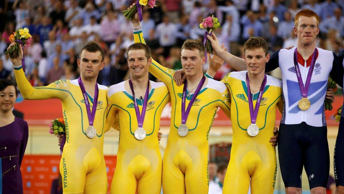 SO CLOSE: Bendigo’s Glenn O’Shea (second from left) celebrates with his team-mates Jack Bobridge, Rohan Dennis and Michael Hepburn after their Olympic silver-medal win in the men’s team pursuit track cycling on Saturday Picture: REUTERS