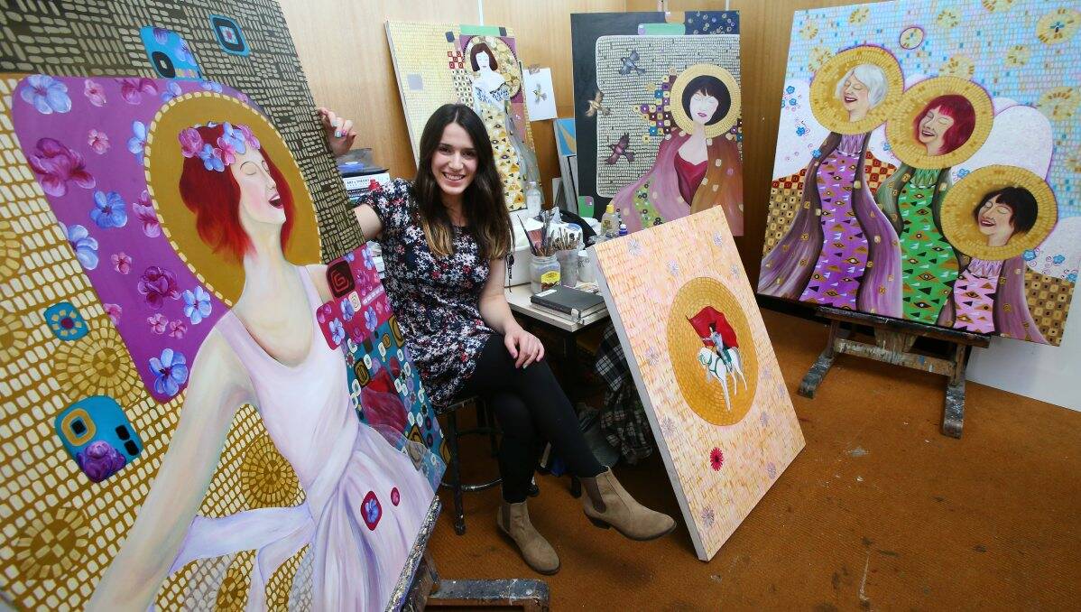 Alanah Brand with her portraits. Picture: Peter Weaving
