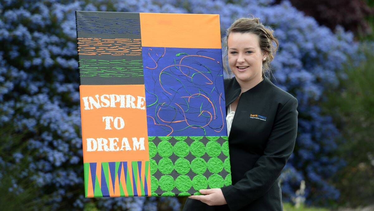 FOR SALE: Rebecca Flood from bankmecu with her piece to be auctioned tonight. Picture: JIM ALDERSEY