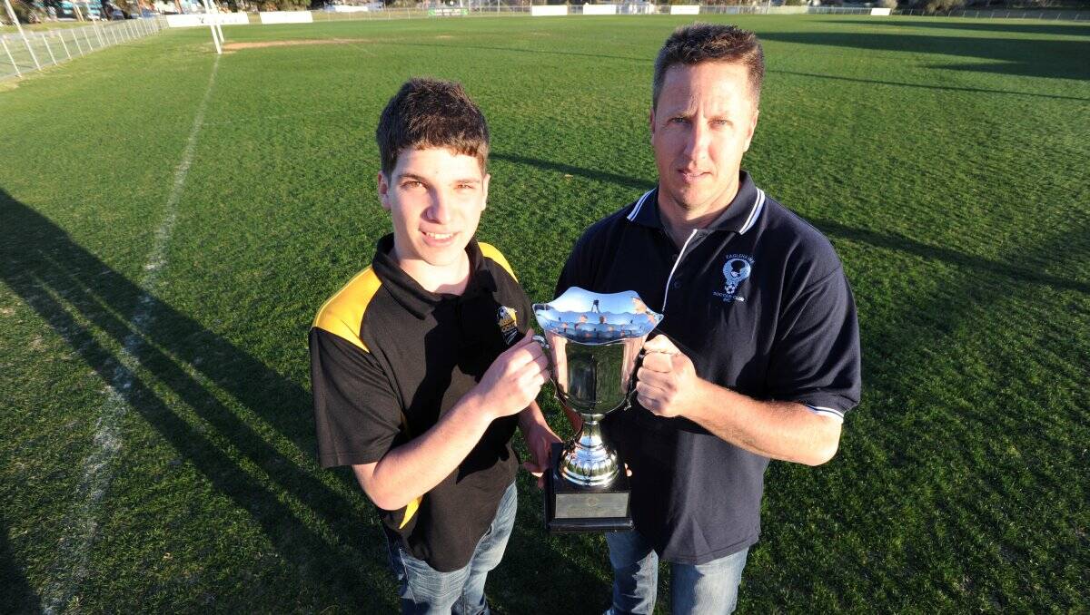 UP FOR GRABS: Colts United's Daniel Petrolito and Eaglehawk's Colin Samuel hold the BASL's division one Knockout Cup. Picture: PETER WEAVING