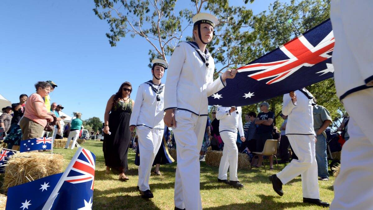 PROUD: Australian Navel Cadets raise the flag at the Bendigo Australia Day ceremony at Lake Weeroona. Picture: JIM ALDERSEY