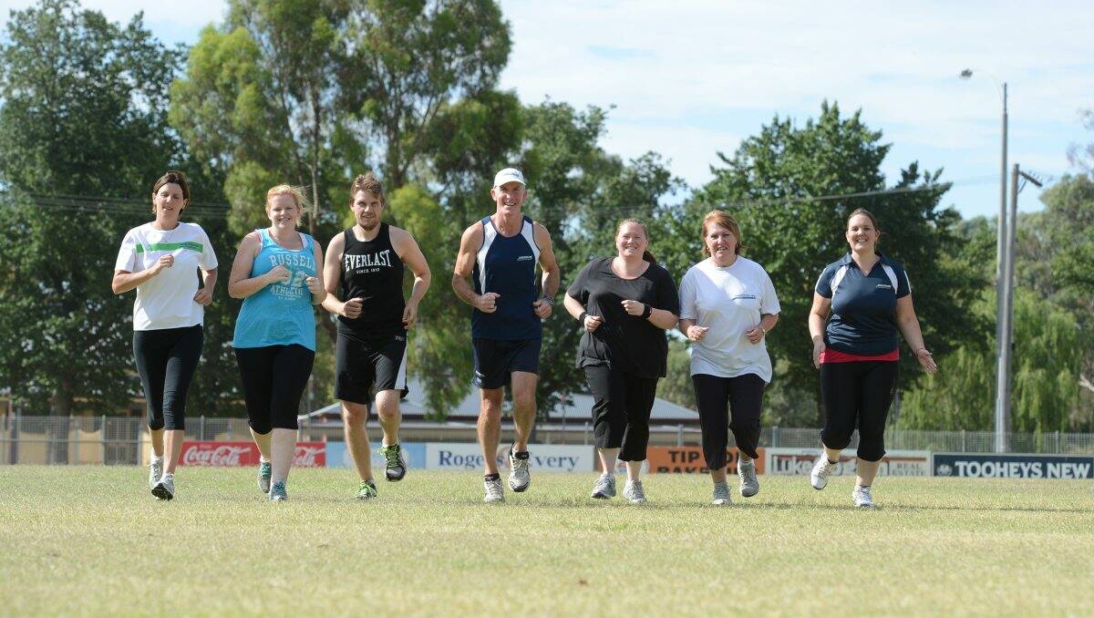 Training: Rachel Gard, Emma O’Brien, Tim O’Brien, personal trainer Mick Talbot, Jessica McHardy, Kathy Constable and Hayley Blundell getting ready for the Elmore fun run. Picture: Jim Aldersey