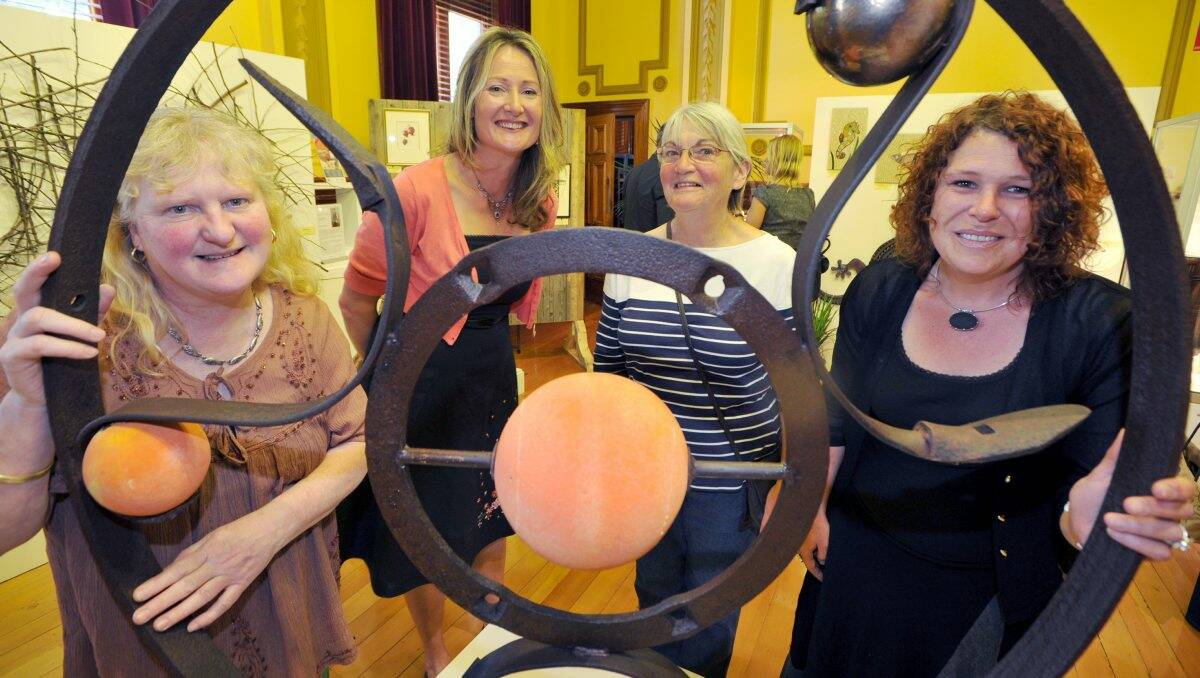 INSPIRED: Artists Angie Robinson, Tracey Koolen, Leonie Ahul and Sarah Fowler with Tracey’s sculpture ‘Celestial Ring’ at the Bendigo Visitor’s Centre Living Arts Space. Picture: Julie Hough