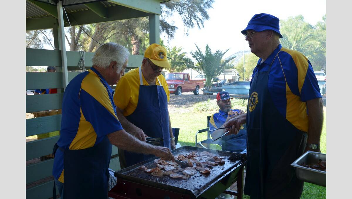 Dean Frankel, Dominic Caputo and Barry McGree, from the Lions Club of Port Pirie, helped cook a delicious barbecue breakfast.