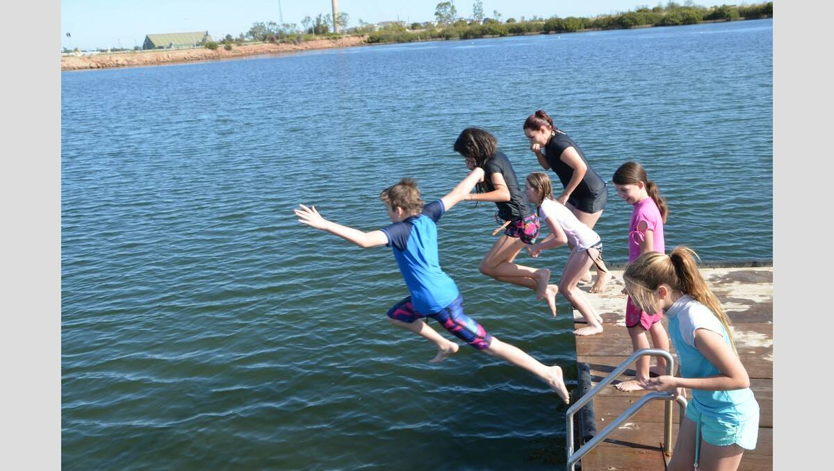 Kids had fun jumping off the jetty at the Australia Day celebrations.