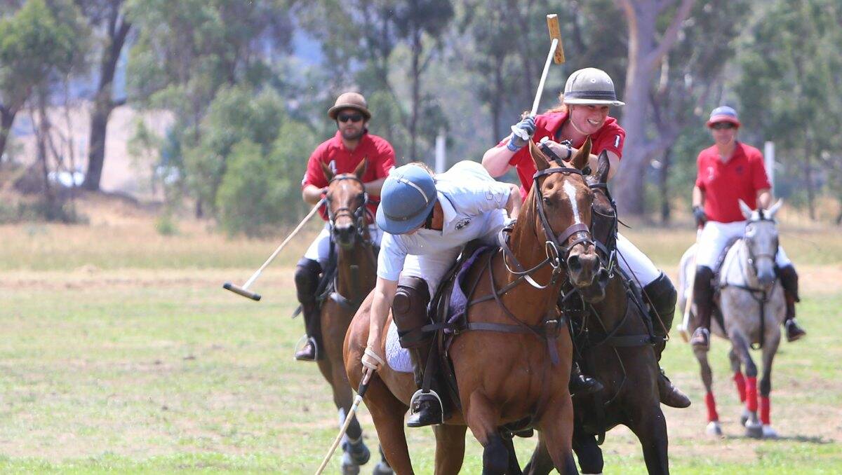 SKILLED: Polo players shape up in yesterday’s historic clash.  