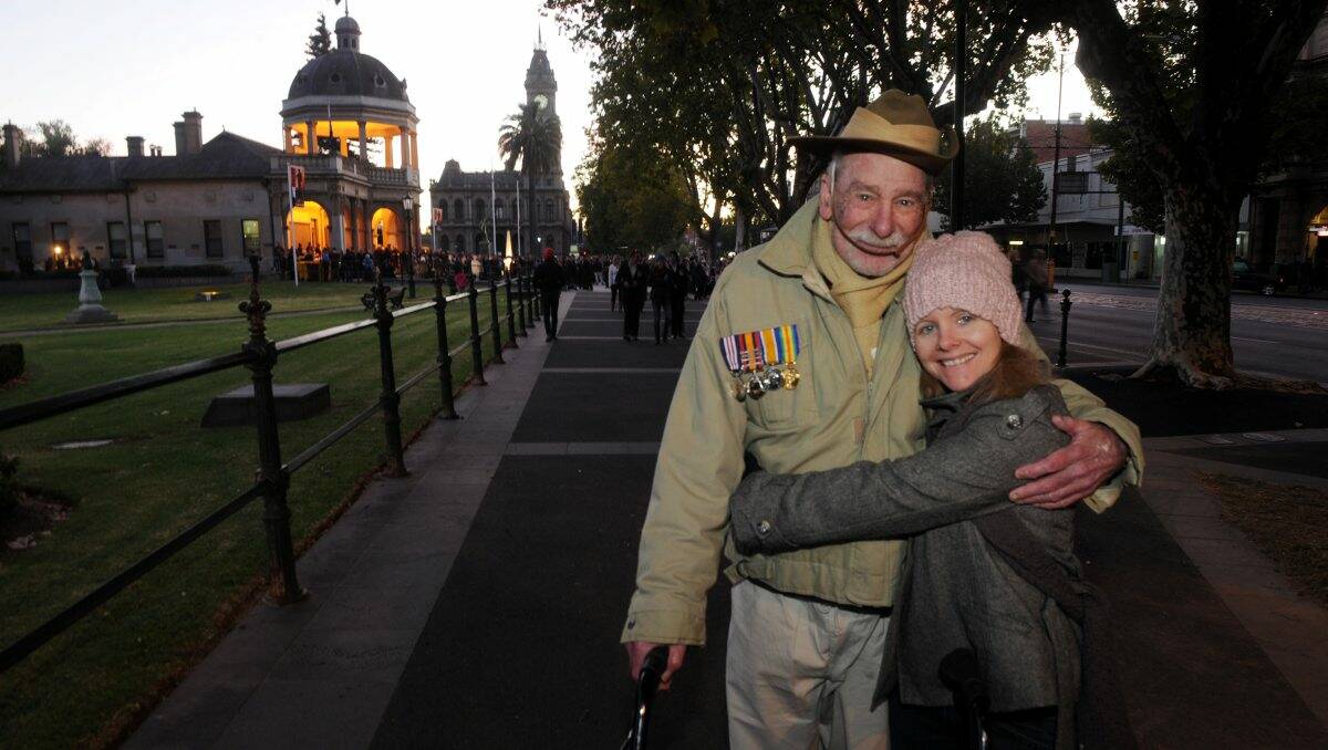 TRADITION: Former army corporal Kevin Berry, who served from 1970 to 1990, with his daughter, Anita Bluemore. Picture: BRENDAN McCARTHY