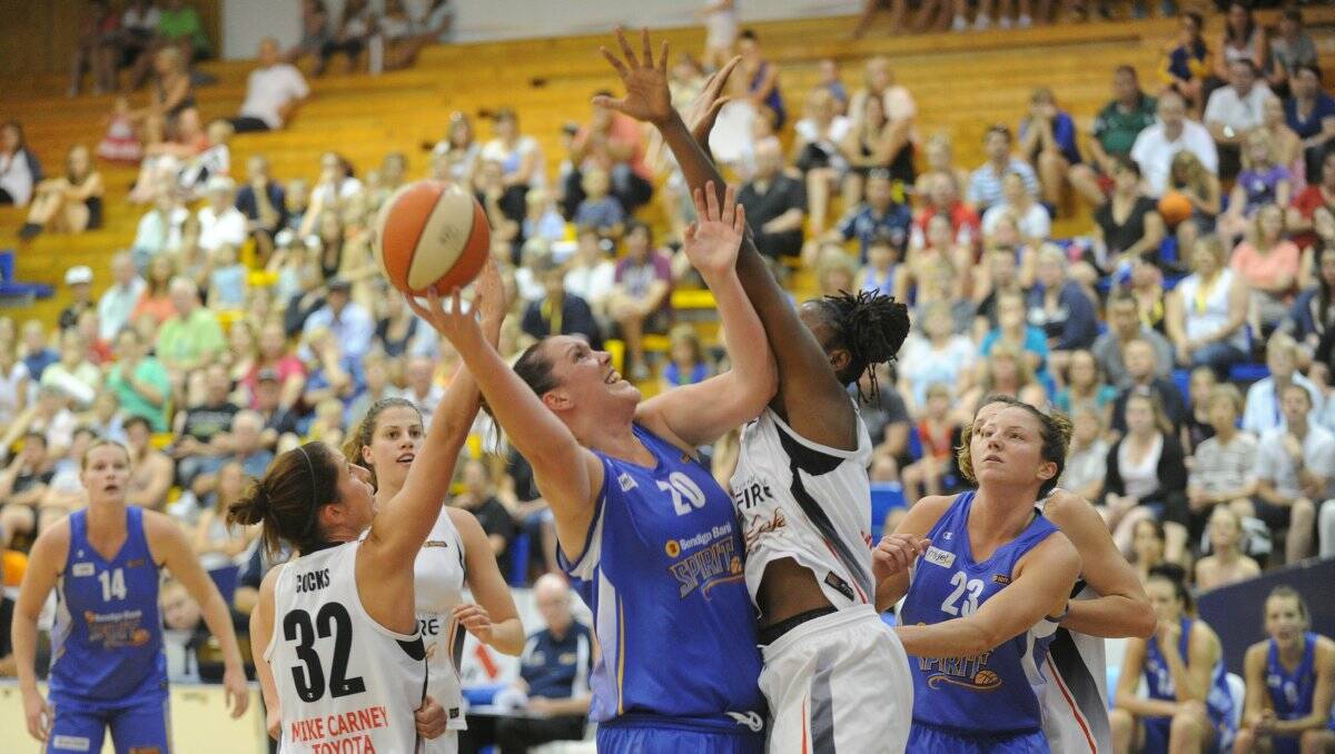 IN THE PAINT: Bendigo Spirit centre Gabe Richards looks to score,in Saturday night's hard-fought victory at home against Townsville Fire. Picture: JODIE DONNELLAN