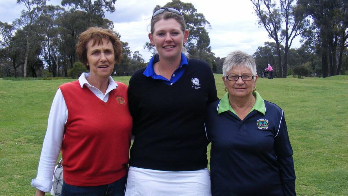 RECORD BREAKER: Jessica Dengate, centre, with Neangar Park women’s captain  Marlene Kelly, left, and women’s president, Enid Delves, right. Picture: supplied