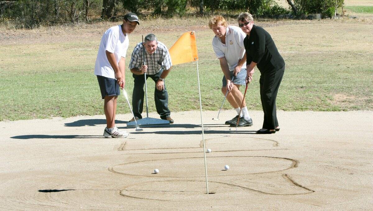 LUCRATIVE DEAL: Quarry Hill Golf Club junior member Jet Cox, secretary Trevor Cox, club captain Robin Dobbie and treasurer Sandra Davey. Picture: PETER WEAVING