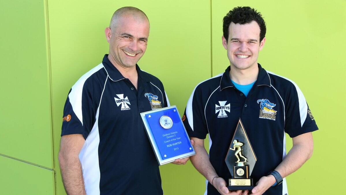 TOP HONOURS: Bendigo Dragons head coach Robert Hunter and defender and Gridiron Victoria division two rookie of the year Tim Curtain. Picture: PETER WEAVING