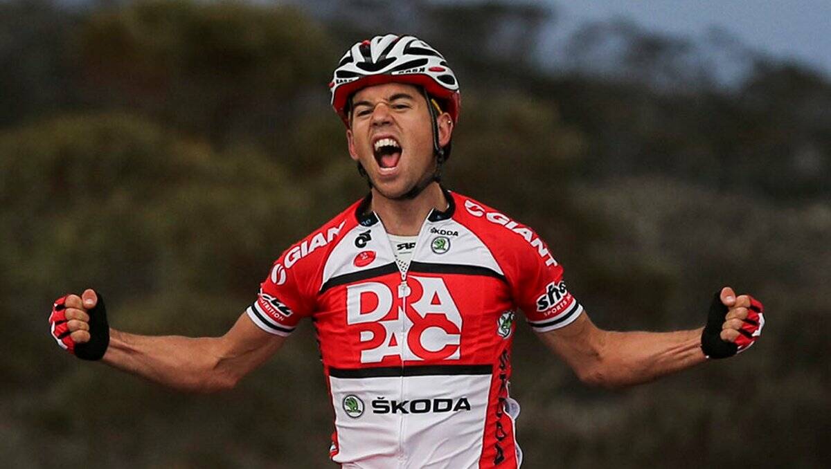 VICTORIOUS: Lachlan Norris celebrates after winning yesterday's stage from Hagley to Great Lake. Picture: Picture: markgunter.com.au 