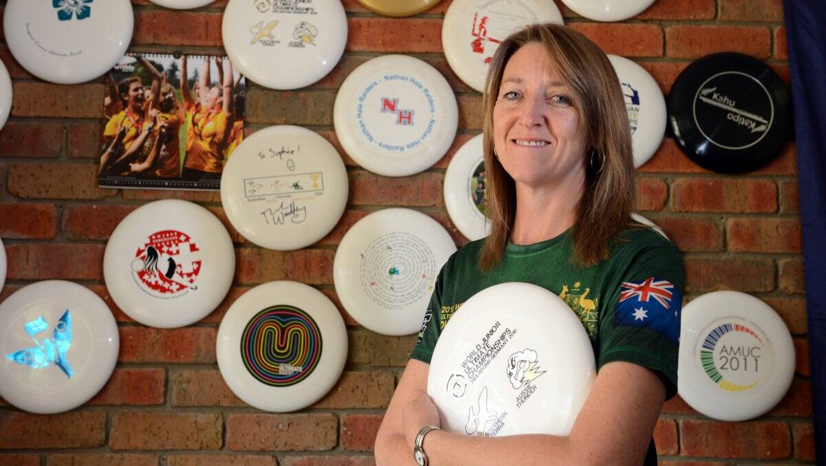 wall of honour: Robin Murdoch reflects on her family’s involvement in the flying disc sport of ultimate. Picture: JIM ALDERSEY