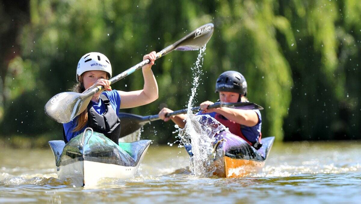 MAKING A SPLASH: Maddie Batters and Kristy Packham training on Bendigo's Lake Weeroona. Picture: PETER WEAVING 