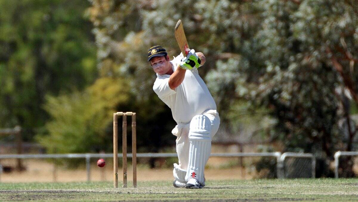 POWERFUL SHOT: Bendigo captain Marcus McKern drives the ball to the White Hills boundary. Picture: JULIE HOUGH 