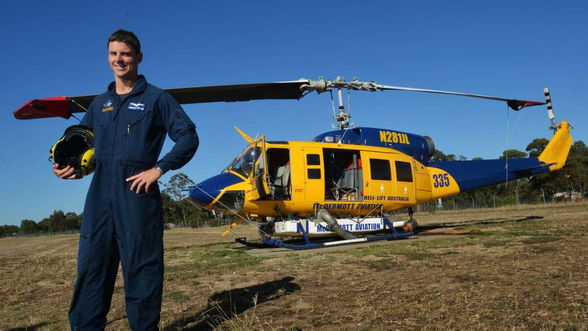 READY FOR ACTION: Helitack 335 pilot Andrew Cottee.