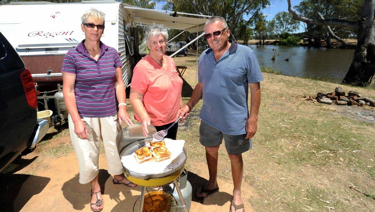 SIMPLE LIFE: Marlene Robinson, Bev Holden and Ron Robinson at Aysons Reserve in Elmore.