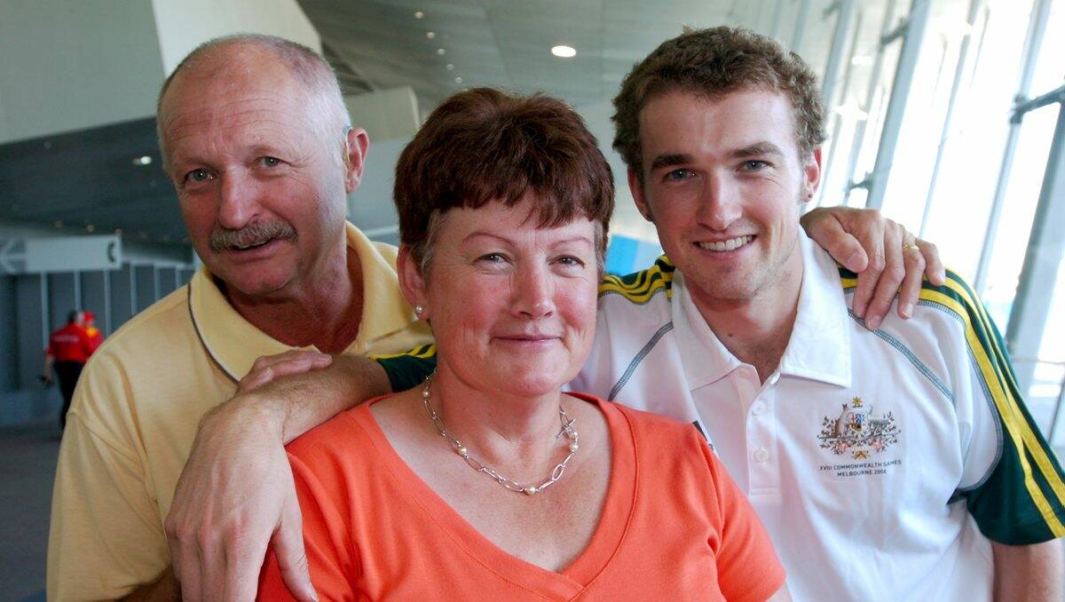 Graeme Warfe, left, with wife Marie and son Glenn before the 2006 Commonwealth Games. 