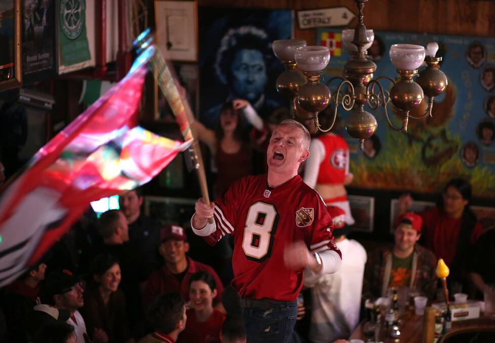 Fans of the San Francisco 49ers glumly look on as their team loses to the Baltimore Ravens. Photo: Justin Sullivan