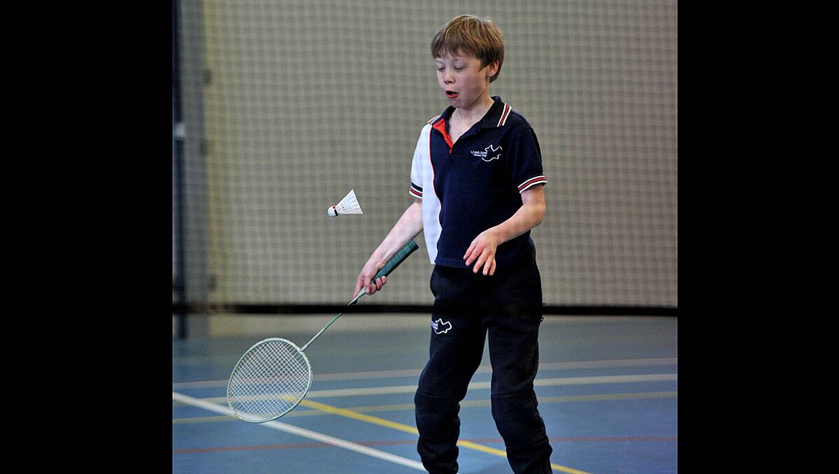 Olympics at Creek Street Christian College. Badminton grade 4 student Mitchell Cook. Photo Peter Waeving